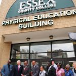 ESSEX COUNTY EXECUTIVE DIVINCENZO AND ESSEX COUNTY COLLEGE PRESIDENT BOAKYE DEDICATE THE ESSEX COUNTY COLLEGE ATHLETIC BUILDING AS THE “ESSEX COUNTY COLLEGE CLEO HILL, SR. PHYSICAL EDUCATION BUILDING” Naming Recognizes Mr. Hill’s Historic Role in NBA History and His Successful Career as Essex County College Basketball Coach and Athletic Director